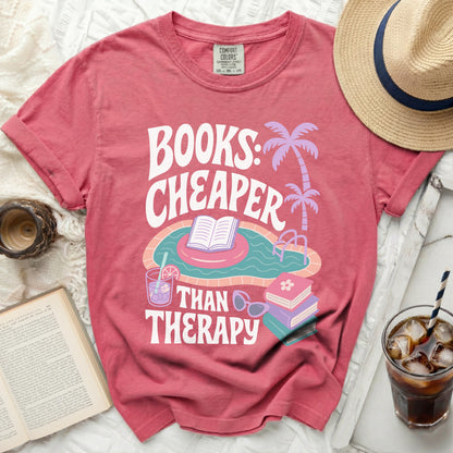 T-shirt with "Books: Cheaper Than Therapy" text and pool graphic.