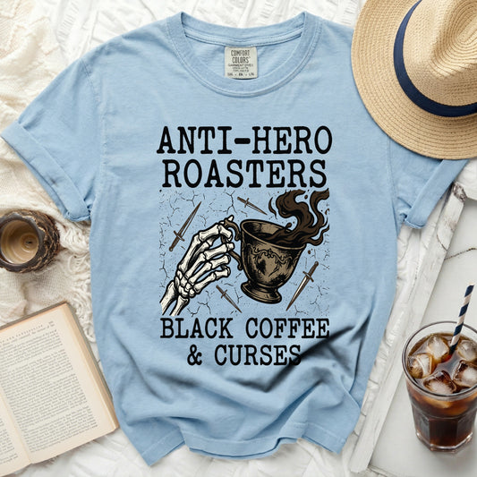 Light blue t-shirt with "ANTI-HERO ROASTERS BLACK COFFEE & CURSES" graphic.