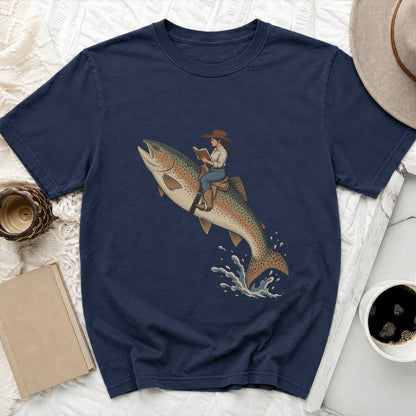Illustration of person in cowboy hat riding a trout and reading a book.