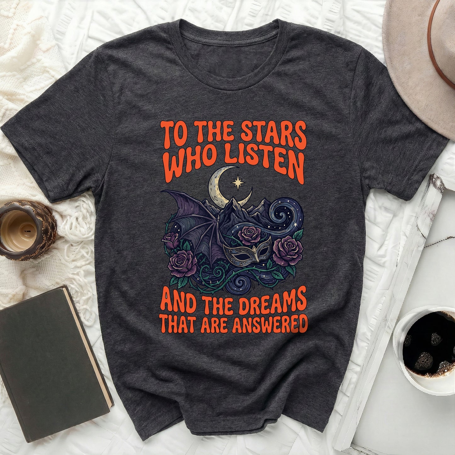 TO THE STARS WHO LISTEN AND THE DREAMS THAT ARE ANSWERED product type
Celestial Shirt, Moon Star Design, Fantasy Graphic, Bat Wing Mask, Rose Artwork, Dark Aesthetic, Gothic Apparel, Mystical Print, Quote T-Shirt, Literary Fan, Book Lover Gift, Night Sky Art, Unique T-Shirt, Trendy Fashion, Unisex Top, Comfort Tee, Statement Shirt, Dark Academia, Magic Theme, Enchanted Dreams