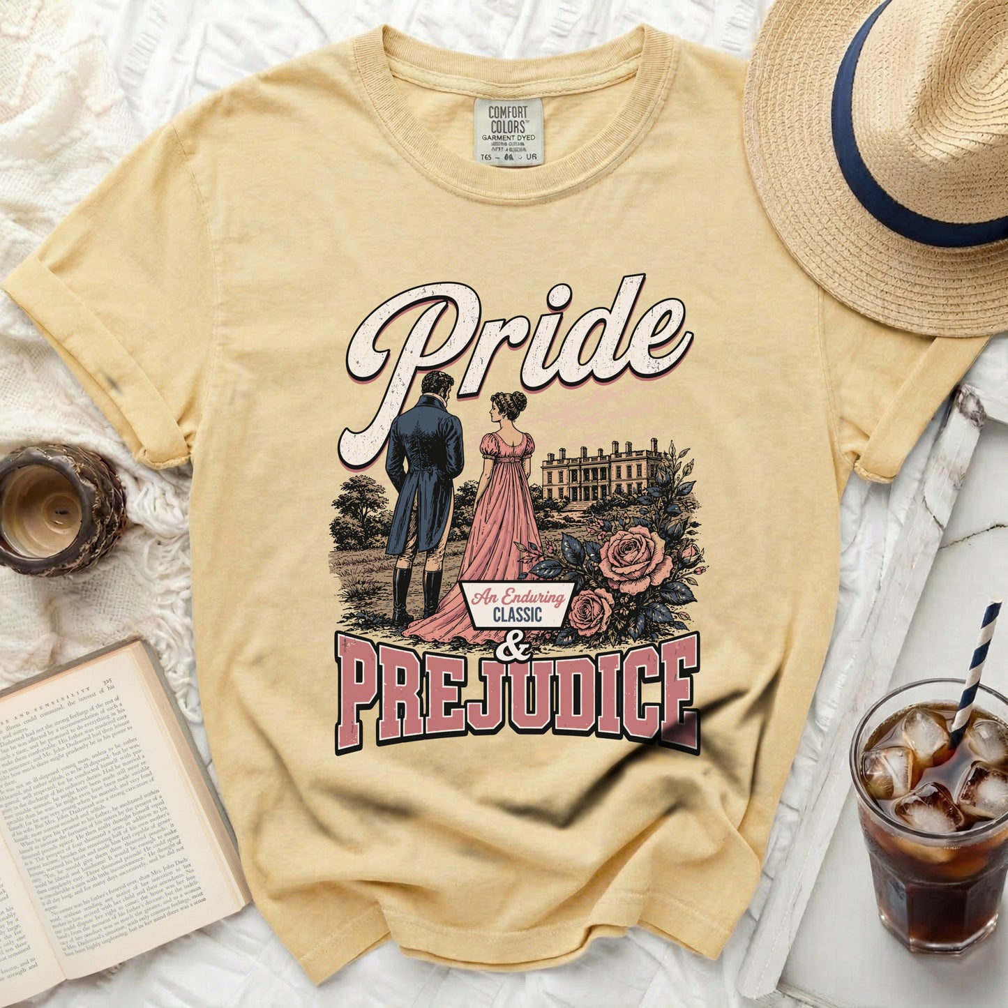 Yellow t-shirt with "Pride & Prejudice" graphic and a couple in period attire.