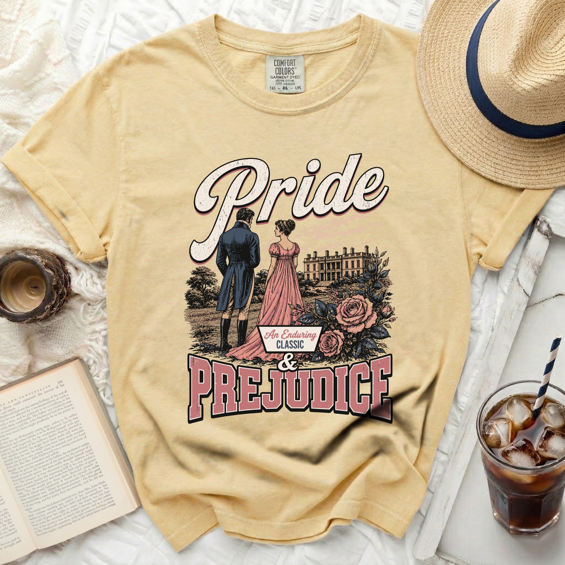 Yellow t-shirt with "Pride & Prejudice" graphic and a couple in period attire.