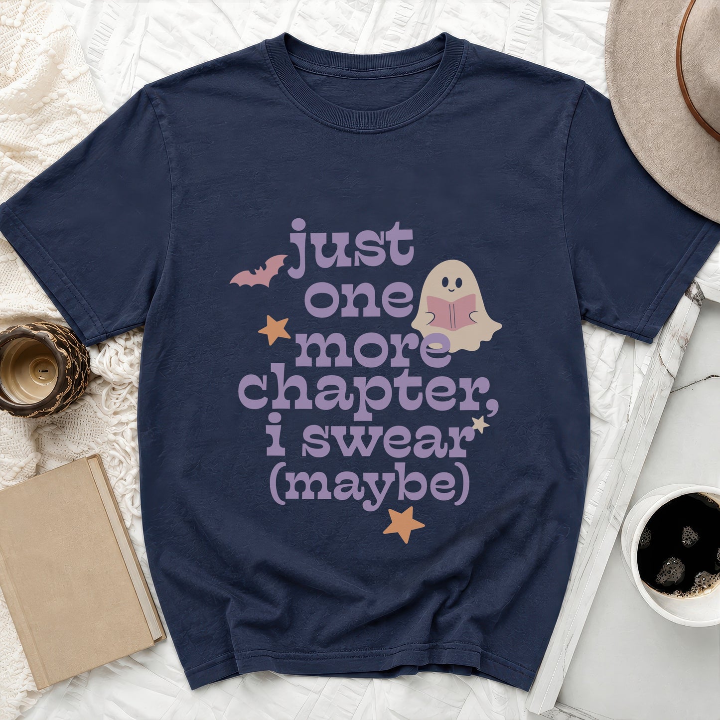Navy t-shirt with ghost reading, "just one more chapter, I swear (maybe)".