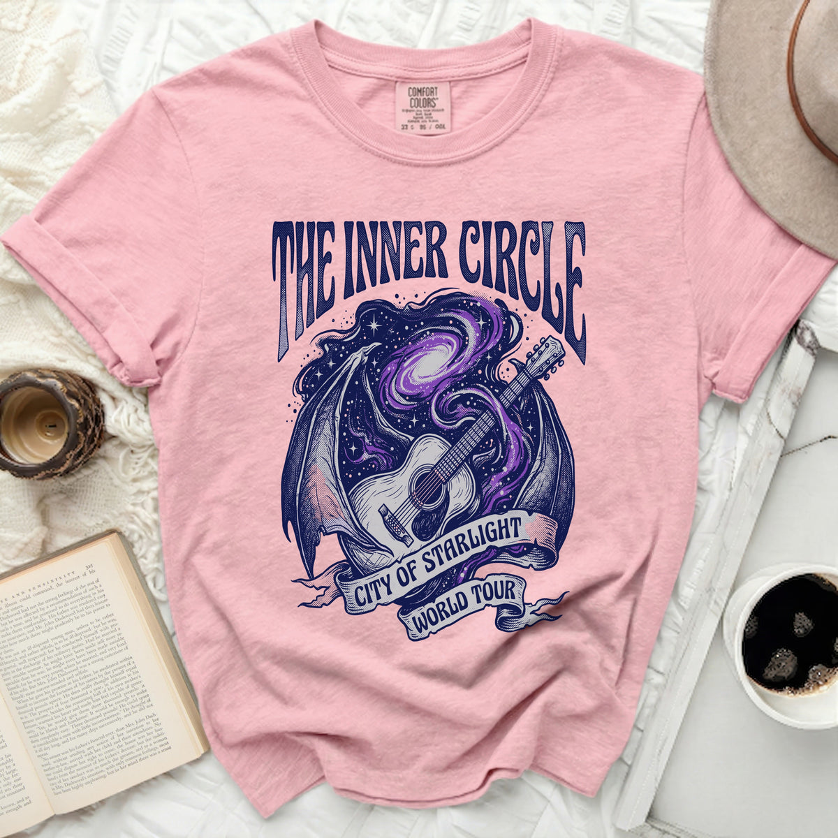 Pink t-shirt with "The Inner Circle City of Starlight World Tour" graphic.