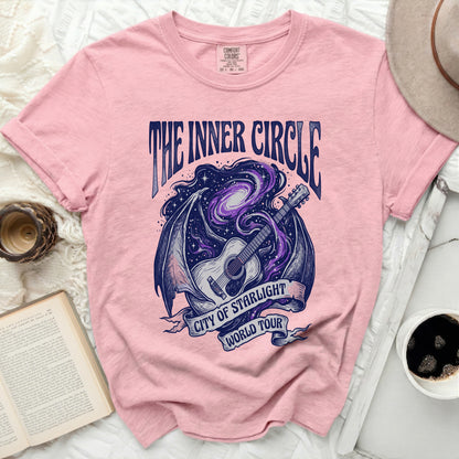 Pink t-shirt with "The Inner Circle City of Starlight World Tour" graphic.