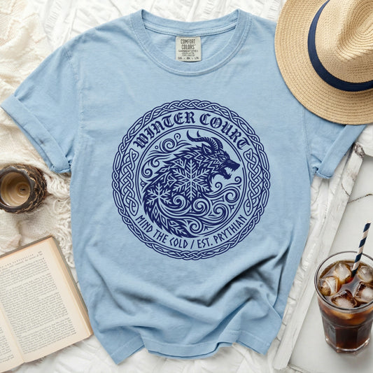 Light blue t-shirt with dark blue "Winter Court" wolf and snowflake graphic.