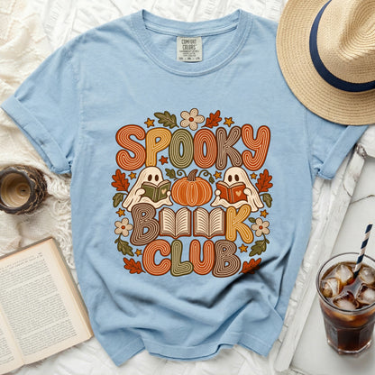 Light blue t-shirt with "Spooky Book Club" text, ghosts, and pumpkin graphic.