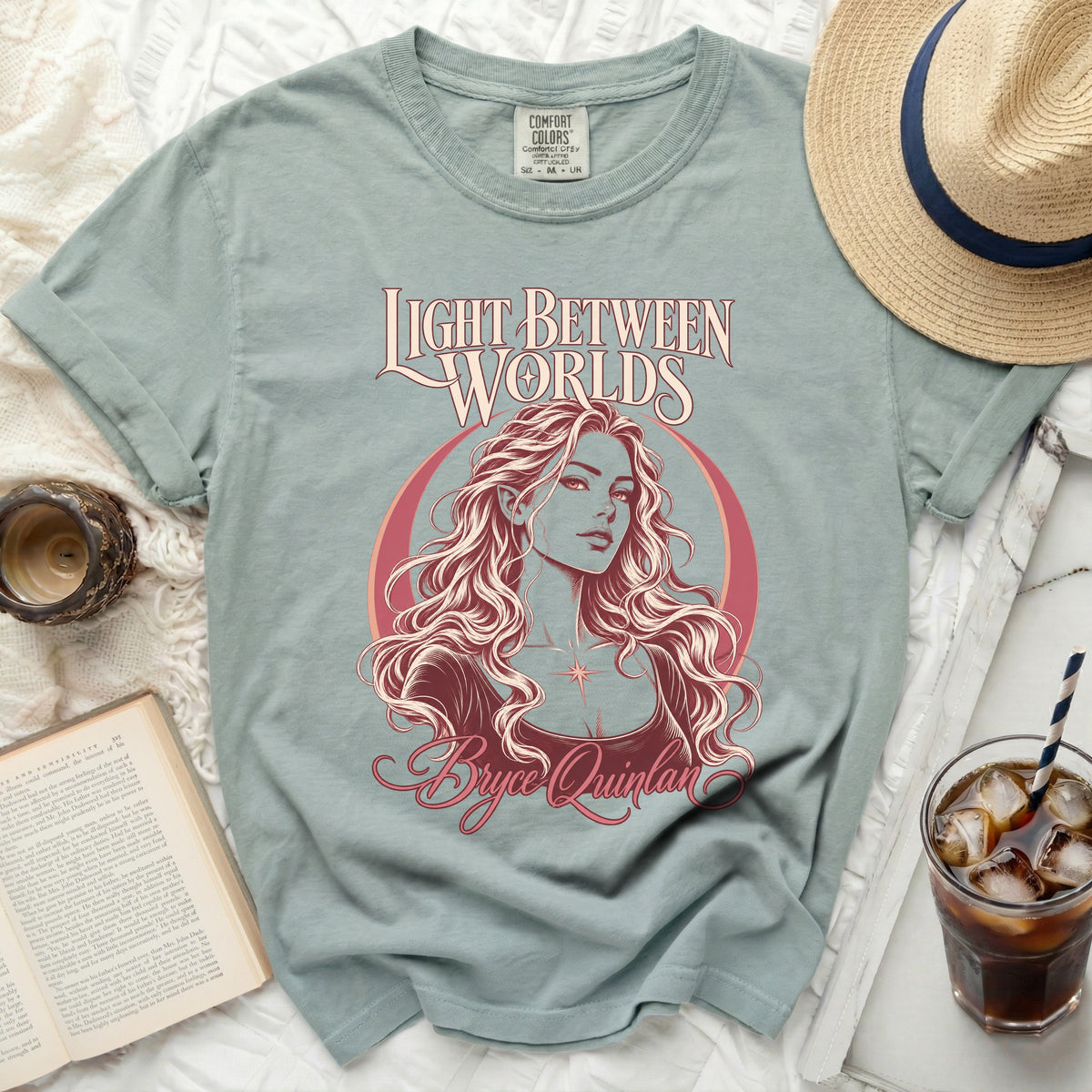 Light Between Worlds graphic tee with Bryce Quinlan illustration and text.