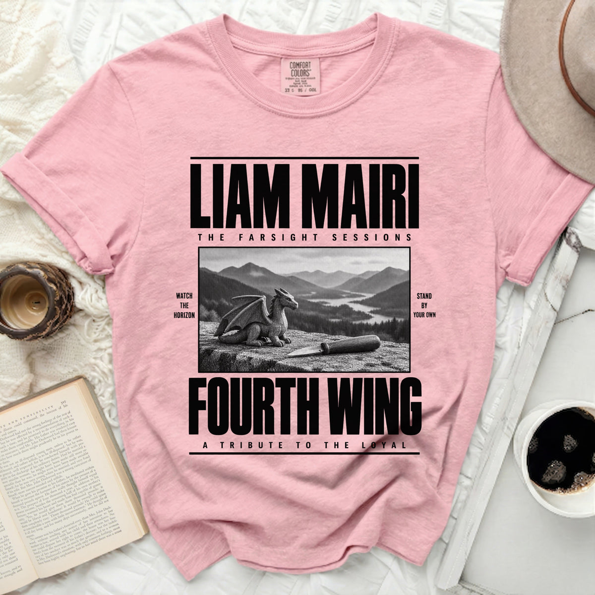 Pink t-shirt with black text: Liam Mairi, The Farsight Sessions, Fourth Wing, and a dragon illustration.