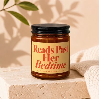 Amber jar candle with "Reads Past Her Bedtime" text.