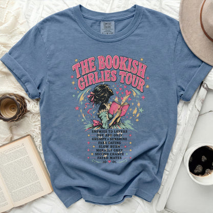Blue Comfort Colors t-shirt with "The Bookish Girlies Tour" text and reading-themed illustrations.