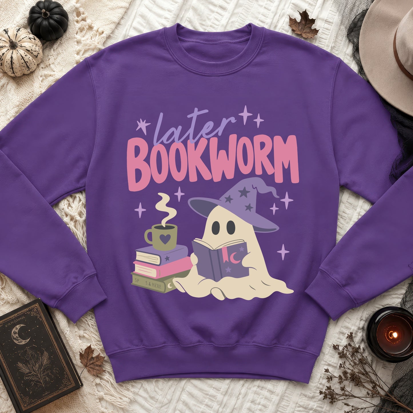 Purple sweatshirt with a graphic of a ghost reading a book and the text "later BOOKWORM".