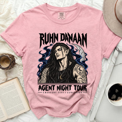 Pink t-shirt with Ruhn Danaan and Agent Night Tour Crescent City Lunathion graphics.