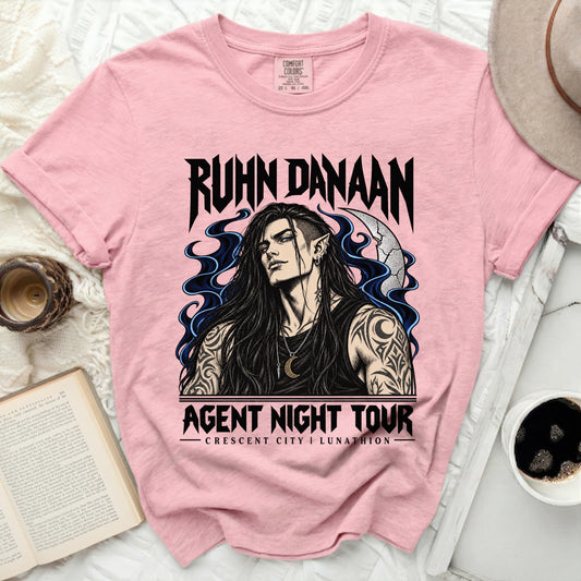 Pink t-shirt with Ruhn Danaan and Agent Night Tour Crescent City Lunathion graphics.