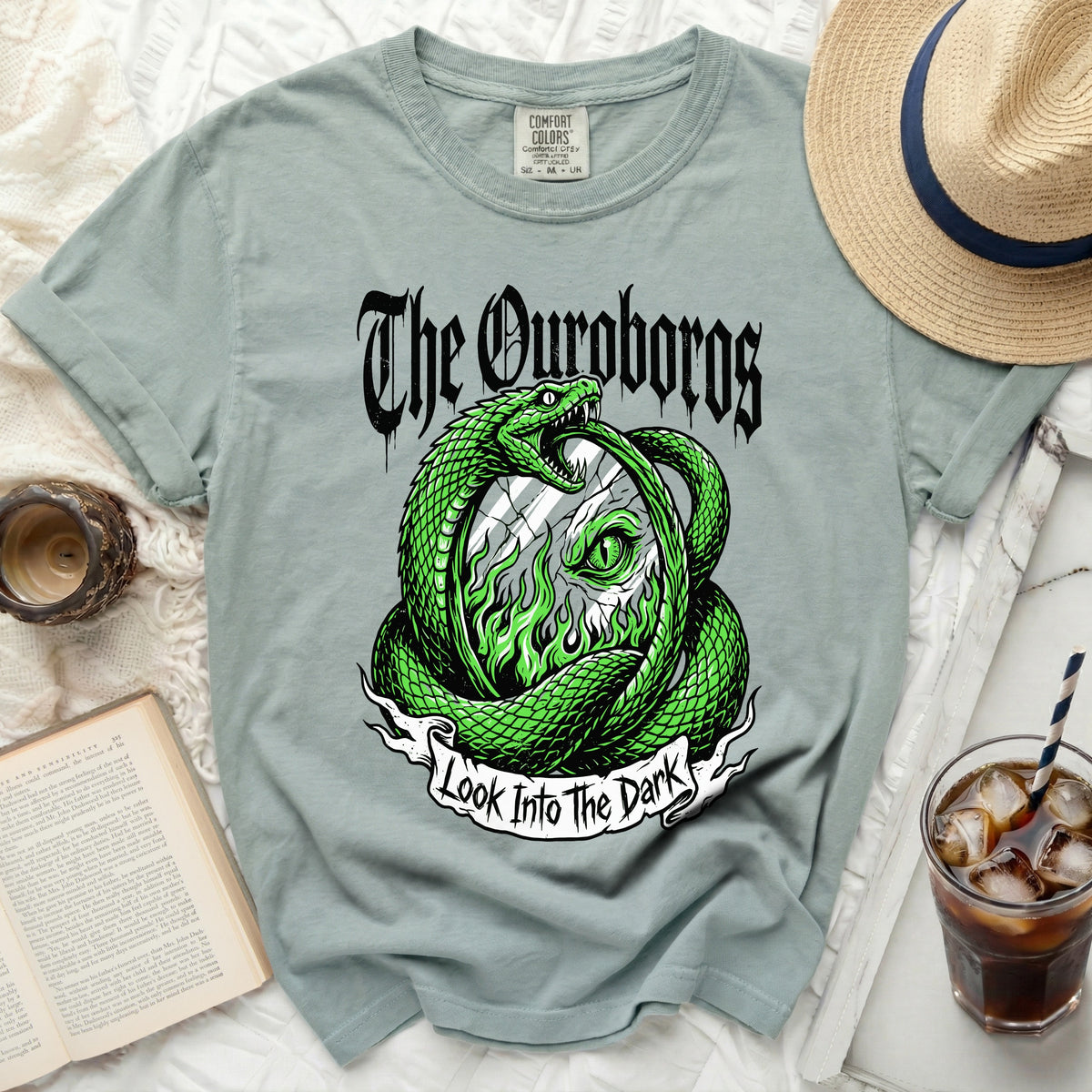 Green snake encircling a clock face with flames and text.