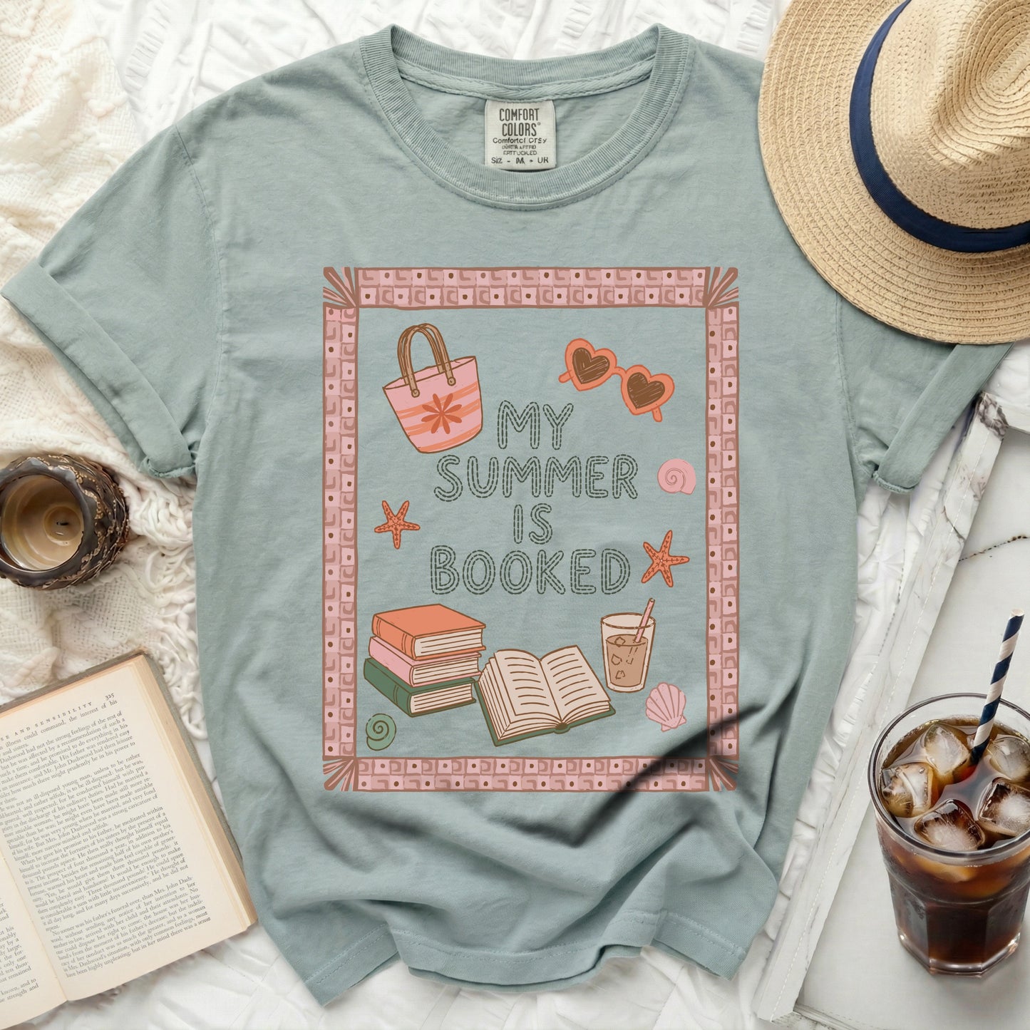 T-shirt with "My Summer Is Booked" text and beach icons.