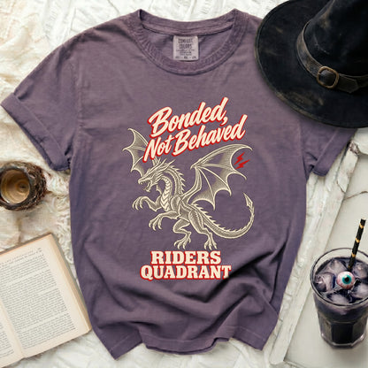 Purple t-shirt with dragon graphic and text "Bonded, Not Behaved RIDERS QUADRANT".