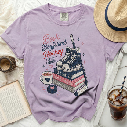 Purple t-shirt with "Book Boyfriend Hockey Perfect Pairing" graphic.