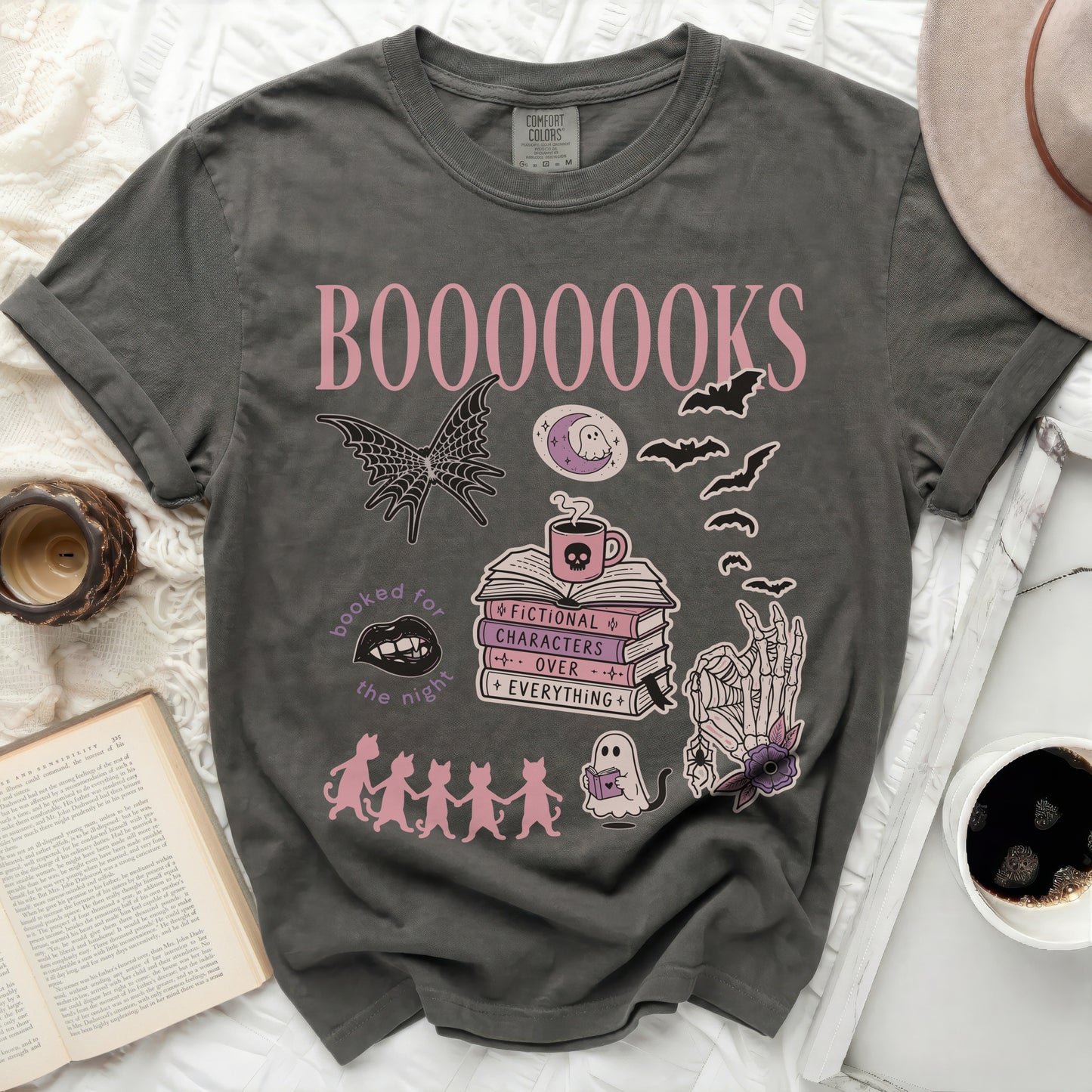 Gray t-shirt with pink text "BOOOOOOKS" and Halloween-themed book illustrations.