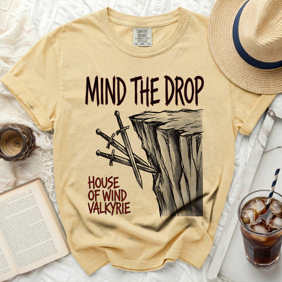 Yellow t-shirt with "Mind the Drop House of Wind Valkyrie" graphic.
