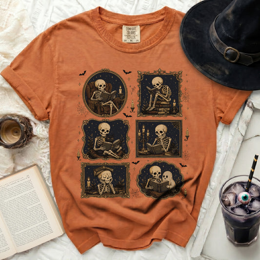 Orange t-shirt with five framed illustrations of skeletons reading.