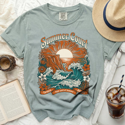 Blue t-shirt with "Summer Court" text and a coastal sunset graphic.