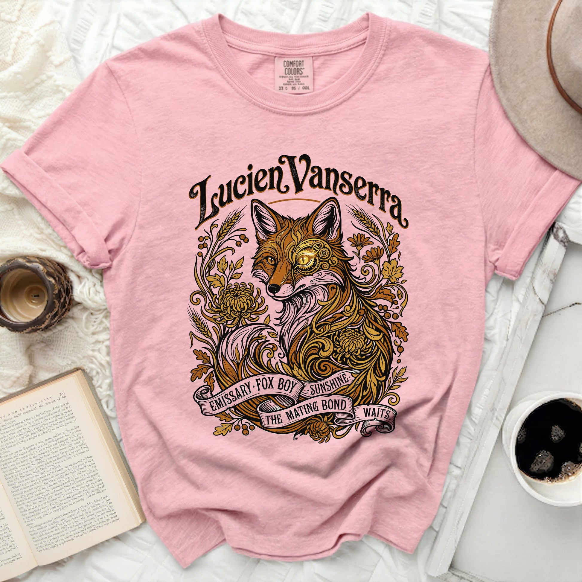Pink t-shirt with ornate fox graphic and text "Lucien Vanserra".