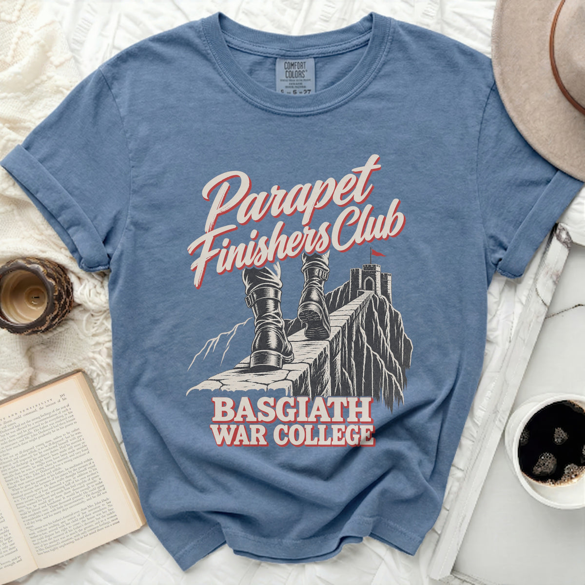 Blue t-shirt with "Parapet Finishers Club" and "Basgiath War College" graphic.
