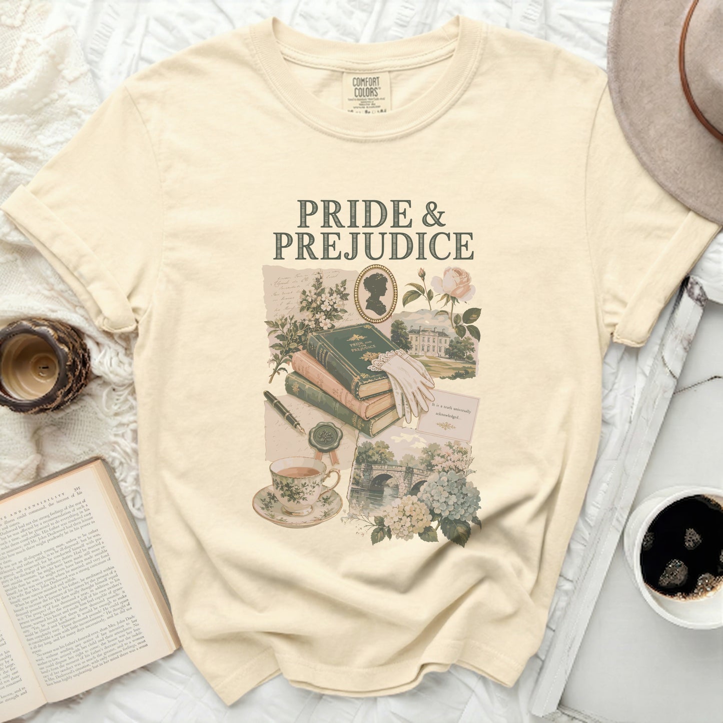 Cream t-shirt with "Pride & Prejudice" text and vintage collage design.