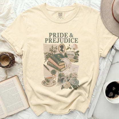 Cream t-shirt with "Pride & Prejudice" text and vintage collage design.