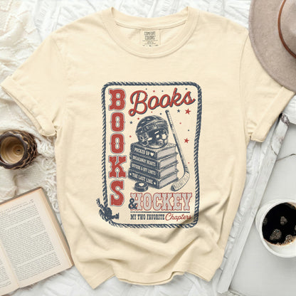 Cream t-shirt with "Books & Hockey" and book/hockey graphic.