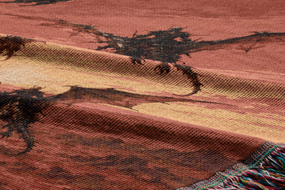 a close-up view of a textured fabric with a dragon design, including a dragon-like creature and a dragon-like pattern.
