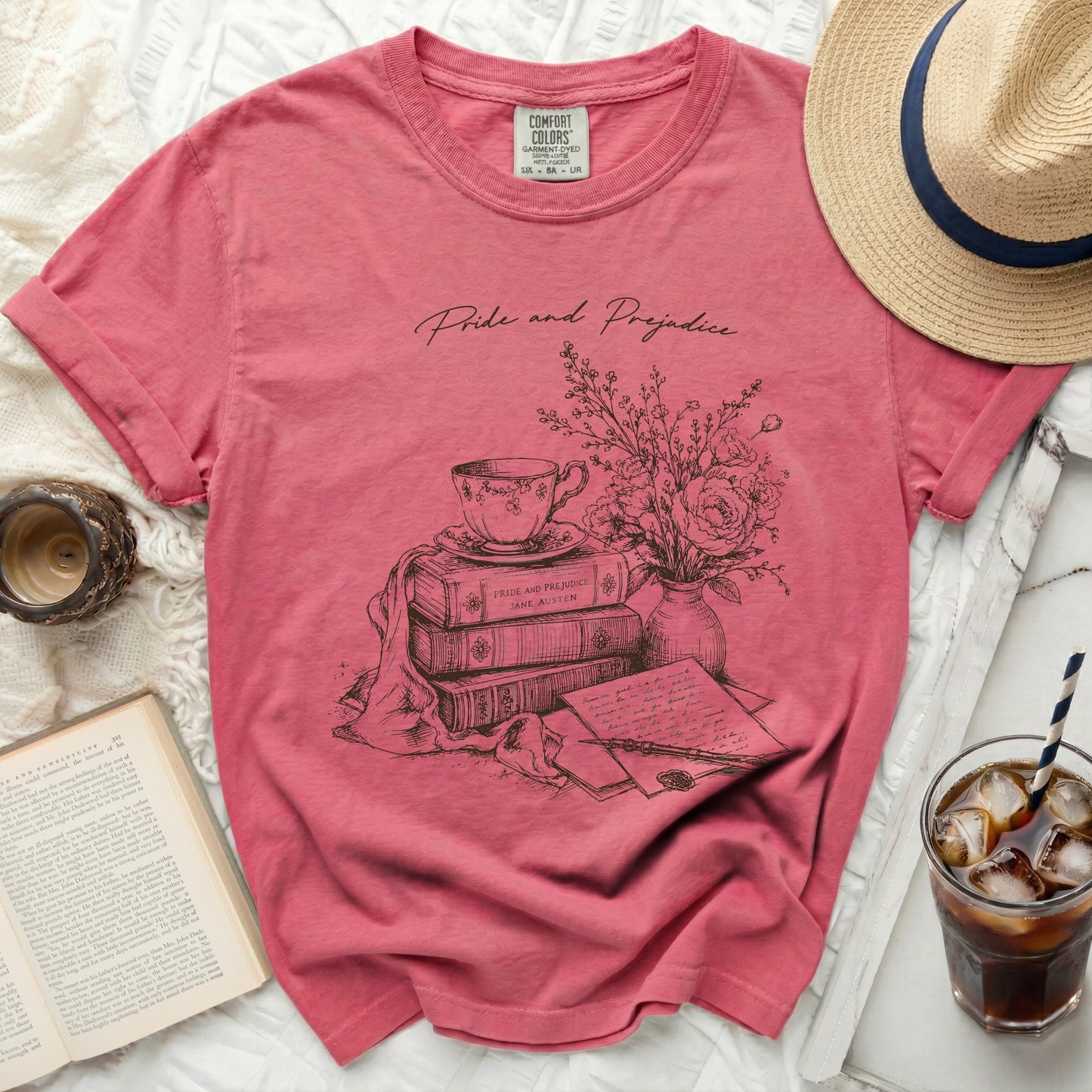 Pink shirt with "Pride and Prejudice Jane Austen" title and illustration.