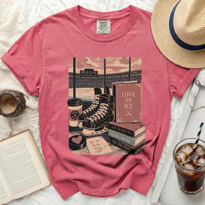 T-shirt with hockey scene, books, coffee, and text "Love on Ice."