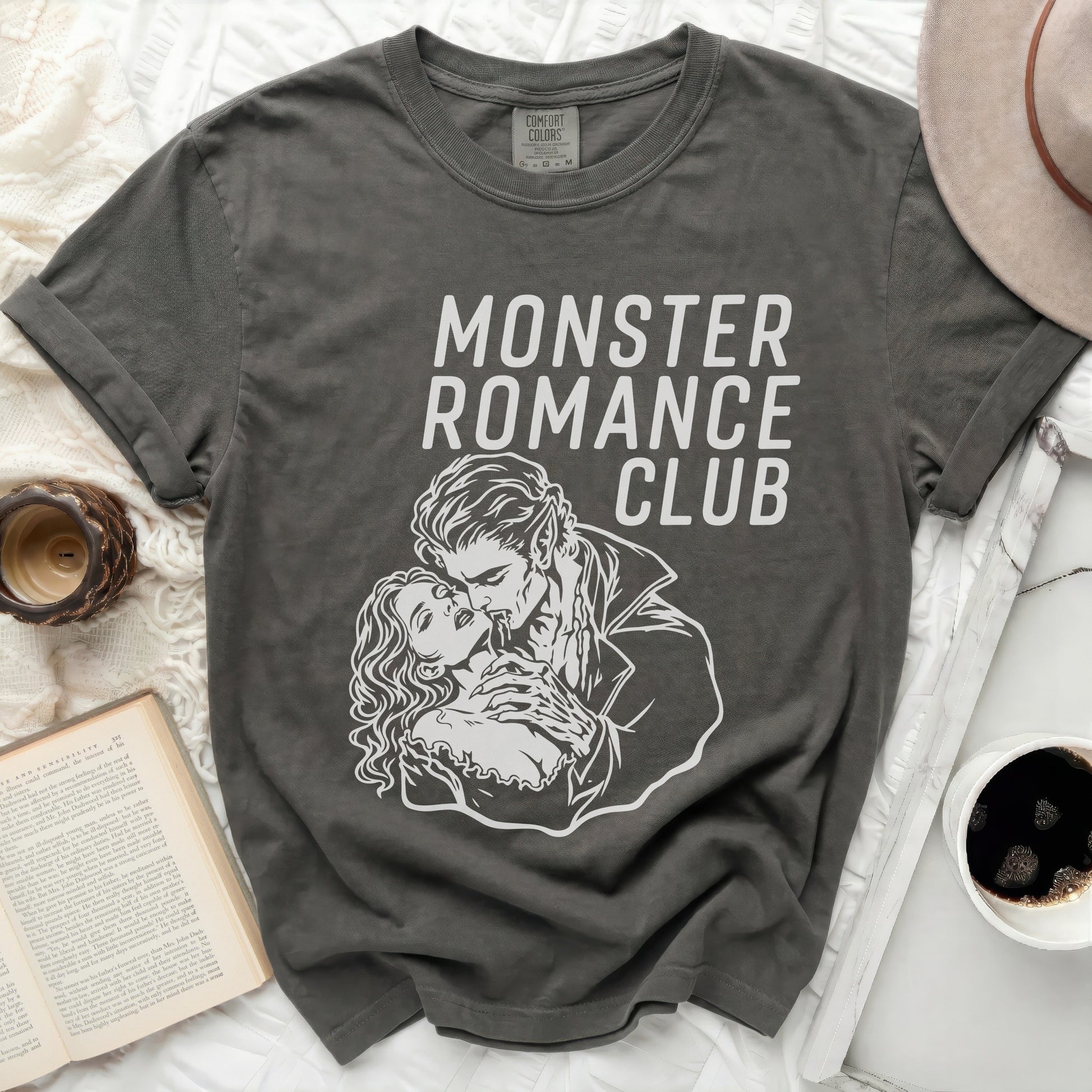 Dark grey t-shirt with "Monster Romance Club" and vampire couple graphic.