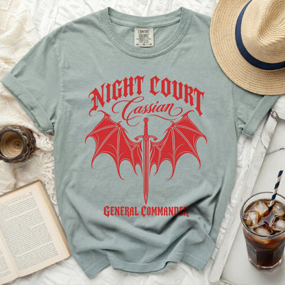 Green t-shirt with red "NIGHT COURT Cassian GENERAL COMMANDER" graphic.