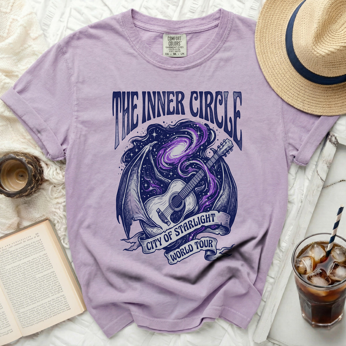 Purple t-shirt with "The Inner Circle City of Starlight World Tour" graphic.