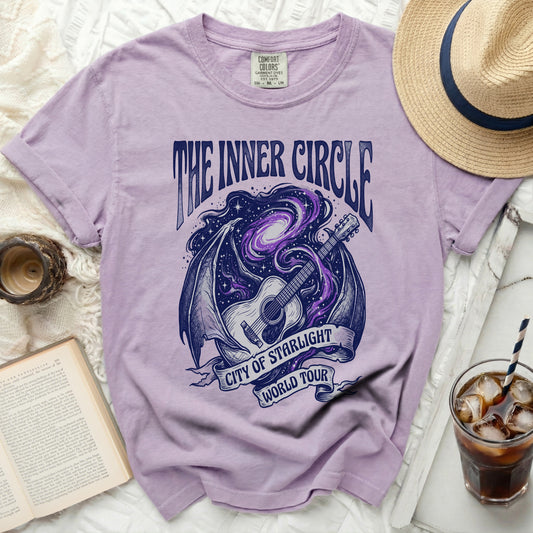 Purple t-shirt with "The Inner Circle City of Starlight World Tour" graphic.