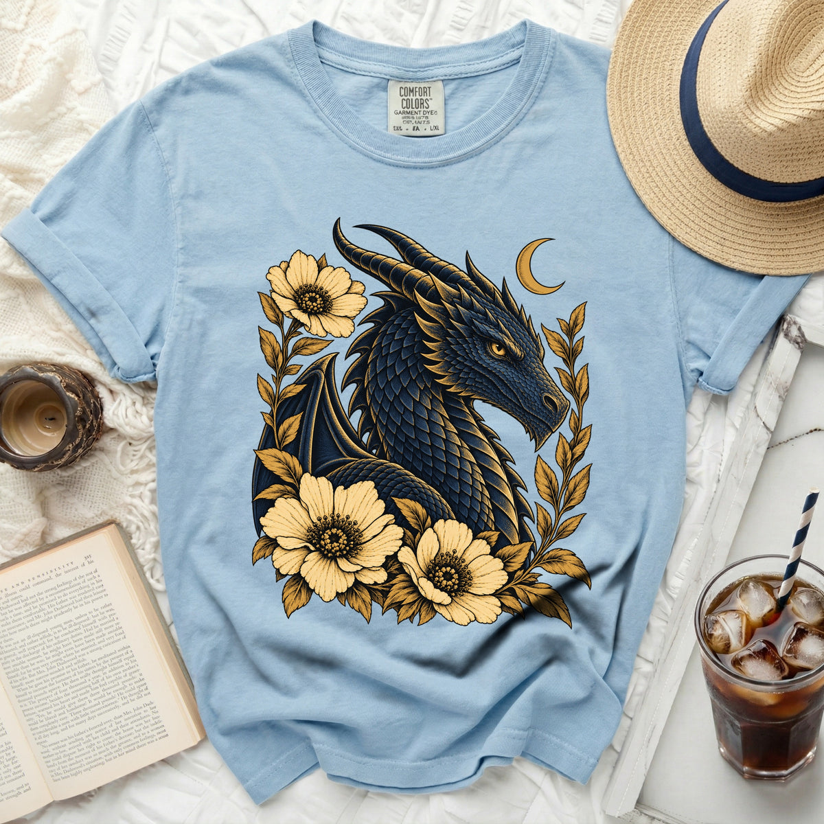 Light blue t-shirt featuring a dark blue dragon with yellow accents and flowers.