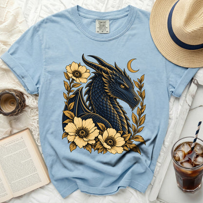 Light blue t-shirt featuring a dark blue dragon with yellow accents and flowers.