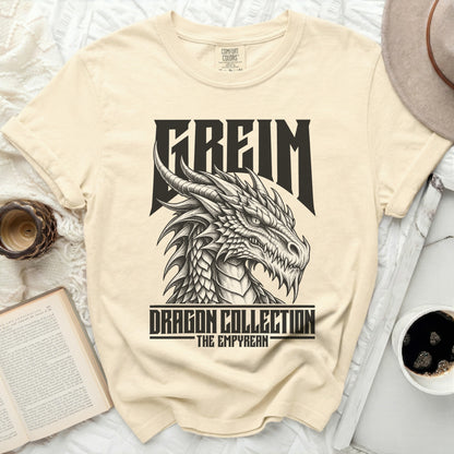 Cream t-shirt with a black detailed dragon graphic and text "FREIM DRAGON COLLECTION THE EMPYREAN".