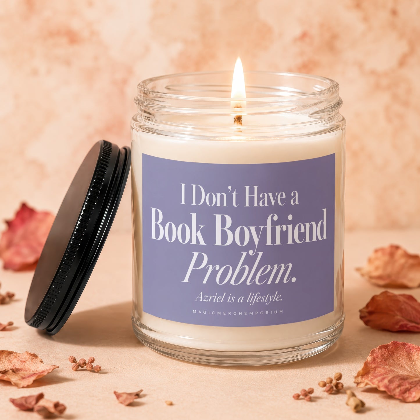 Candle with lit wick and label reading "I Don't Have a Book Boyfriend Problem."