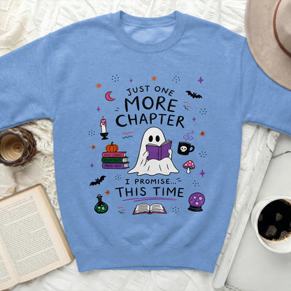 Blue sweatshirt with ghost reading "Just One More Chapter" and "I Promise... This Time".