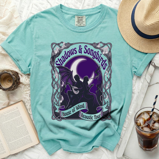 Teal t-shirt with "Shadows & Songbirds House of Wind Acoustic Tour" graphic.