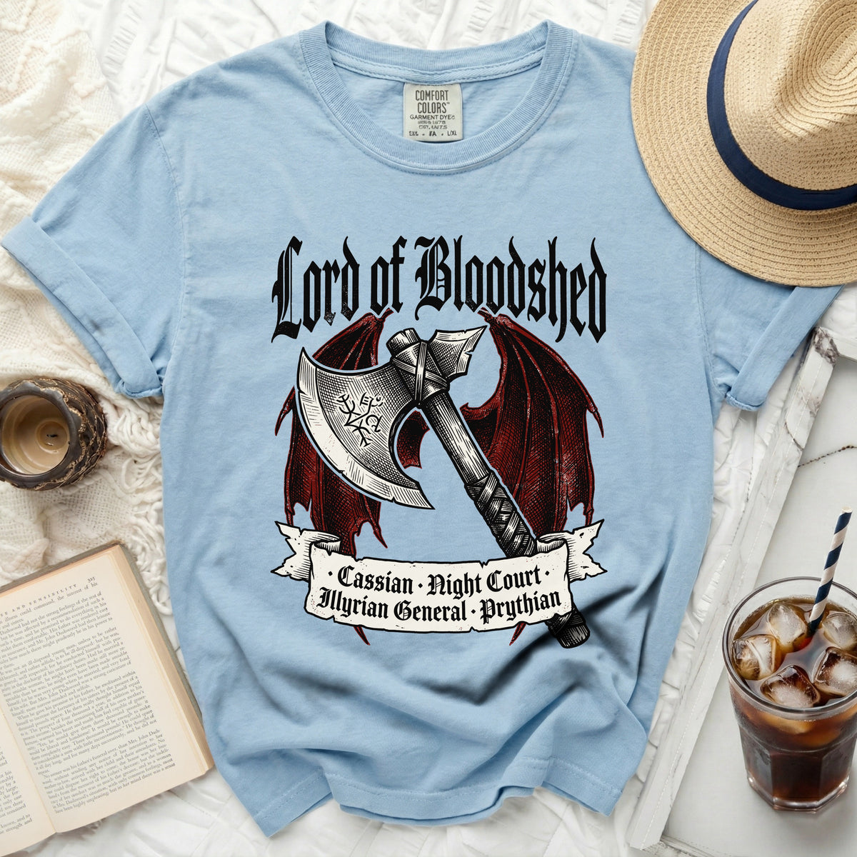 Light blue t-shirt with "Lord of Bloodshed" and axe graphic.