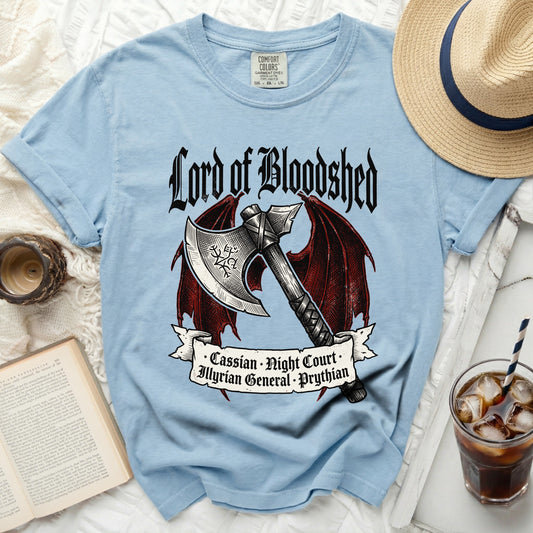 Light blue t-shirt with "Lord of Bloodshed" and axe graphic.