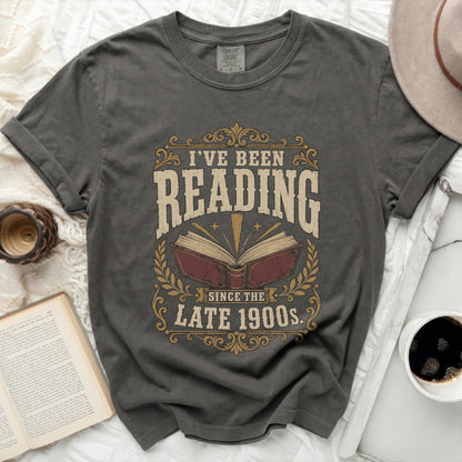 Dark grey t-shirt with "I've Been Reading Since the Late 1900s" graphic.