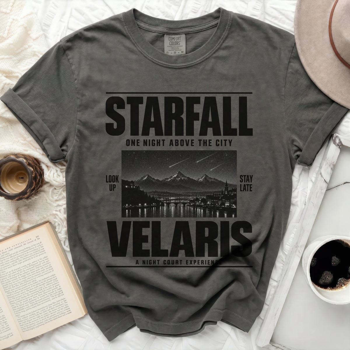 Gray t-shirt with "Starfall One Night Above The City Velaris A Night Court Experience" graphic.