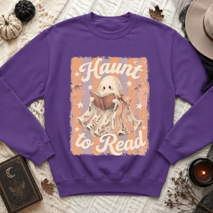 Purple sweatshirt with ghost reading a book graphic that says "Haunt to Read".