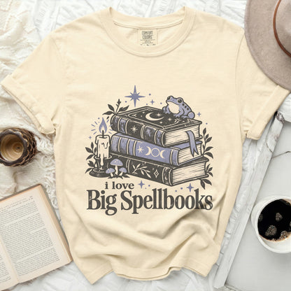Cream t-shirt with "i love Big Spellbooks" text and a stack of spellbooks.